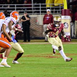 Jr. RB Dalvin Cook lines up two players, one blocker, goes by all of them for a big first down.