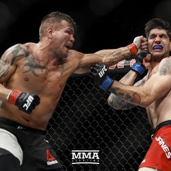 Jack Marshman hits Ryan Janes at UFC Fight Night 113 on Sunday at the The SSE Hydro in Glasgow, Scotland.