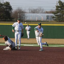 Eastern Michigan turns a double play.<br>