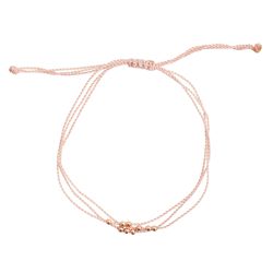 Catbird <a href="https://www.catbirdnyc.com/collections/valentine-s-day/friendship-bracelet-with-rose-gold-beads-pink.html">Friendship Bracelet</a>, $46