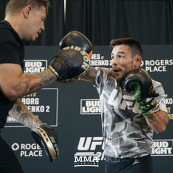 Ray Borg hits mitts at UFC 215 open workouts at the Rogers Place in Edmonton, Alberta, Canada.