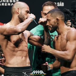 Marco Beltran and Deiveson Figueiredo square off at UFC 212 weigh-ins.