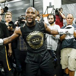 Floyd Mayweather gestures during his media workout.