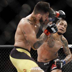 Yancy Medeiros punches Erick Silva at UFC 212.