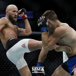 Josh Burkman kicks Drew Dober at UFC 214.