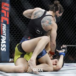 Sara McMann looks for the finish at UFC 215.