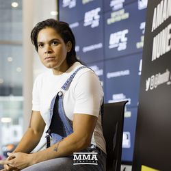 Amanda Nunes takes a seat at UFC 215 media day at the Rogers Place in Edmonton, Alberta, Canada.