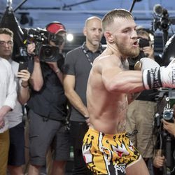 Conor McGregor throws a right at media workouts.
