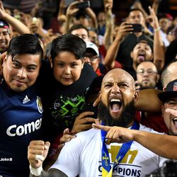 Tim Howard celebrating with the fans.