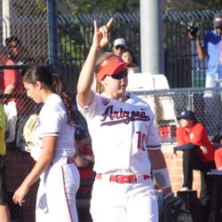 Jessie Harper signals two outs to the outfield