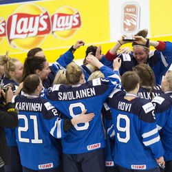 Team Finland celebrate winning the bronze medal.
