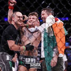 James Gallagher celebrates the win with his team at Bellator NYC.