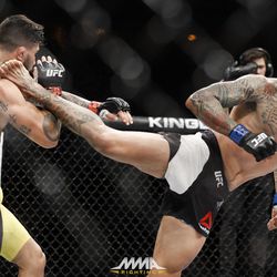 Yancy Medeiros kicks Erick Silva at UFC 212.