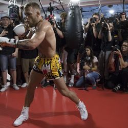 Conor McGregor works out in front of a packed house.