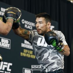 Ray Borg does mittwork at UFC 215 open workouts at the Rogers Place in Edmonton, Alberta, Canada.