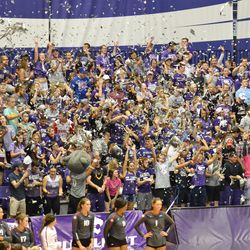 MANHATTAN - The K-State student section tosses torn-up newspapers in the air as the Wildcats' volleyball team is introduced before their match against Arkansas on Aug. 31, 2017.