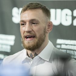 Conor McGregor answers questions at media workout.