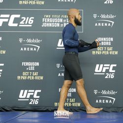 Demetrious Johnson unwrapping the hands during the UFC 216 open workouts Thursday at T-Mobile Arena in Las Vegas.