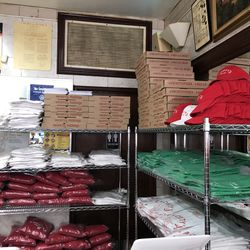 A set-up for all the Yachty’s Pizzeria clothes