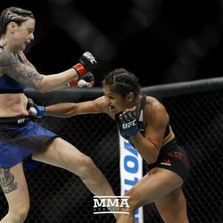 Cynthia Calvillo punches Joanne Calderwood at UFC Fight Night 113 on Sunday at the The SSE Hydro in Glasgow, Scotland.