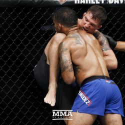 Dennis Bermudez tries for a takedown at UFC on FOX 25.
