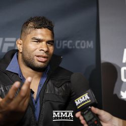 Alistair Overeem answers a question at UFC 213 media day.