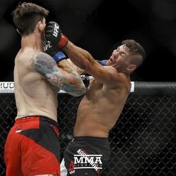 Jack Marshman trades blows with Ryan Janes at UFC Fight Night 113 on Sunday at the The SSE Hydro in Glasgow, Scotland.