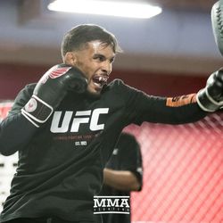 Dennis Bermudez hitting mitts at UFC on FOX 25 open workouts Thursday at UFC Gym in New Hyde Park, N.Y.