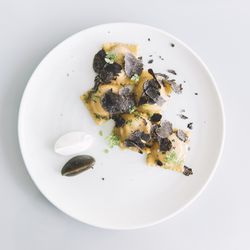 Ravioli — sweet potato, black truffle 