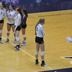 MANHATTAN - K-State junior Macy Flowers listens to coach Suzie Fritz during a stopage of play in a match against Arkansas on Aug. 31, 2017.