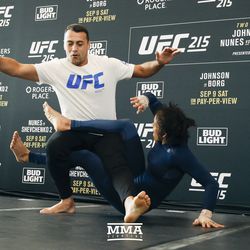 Amanda Nunes practices a scissor takedown at UFC 215 open workouts at the Rogers Place in Edmonton, Alberta, Canada.