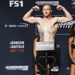 Justin Gaethje hits the scale at the TUF 25 Finale ceremonial weigh-ins Thursday at Park Theater in Las Vegas.