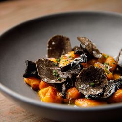 Sweet potato gnocchi with black trumpet mushrooms and black truffle
