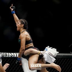 Cynthia Cavillo celebrates her win over Joanne Calderwood at UFC Fight Night 113 on Sunday at the The SSE Hydro in Glasgow, Scotland.