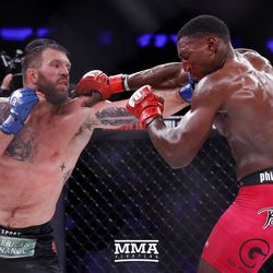 Ryan Bader connects with Phil Davis at Bellator NYC.