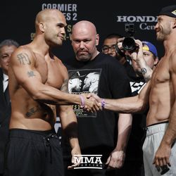 Robbie Lawler and Donald Cerrone shake hands.