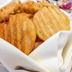 Cottage fries, ordered separately, and served in a bowl made out of napkin folds