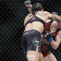 Amanda Nunes elbows Valentina Shevchenko at UFC 215.