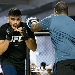 Kelvin Gastelum hits mitts at UFC on FOX 25 open workouts Thursday at UFC Gym in New Hyde Park, N.Y.