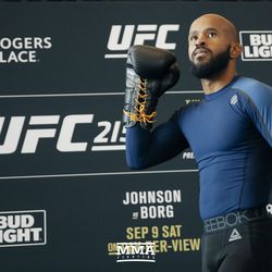 Demetrious Johnson salutes the crowd at UFC 215 open workouts at the Rogers Place in Edmonton, Alberta, Canada.