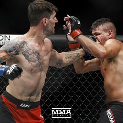 Ryan Janes punches Jack Marshman at UFC Fight Night 113 on Sunday at the The SSE Hydro in Glasgow, Scotland.
