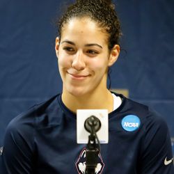 UConn’s Kia Nurse (11) is all smiles during the postgame press conference.