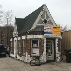 This used to be a gas station office, now a car rental agency, one of the few old buildings remaining on Clark across from the park
