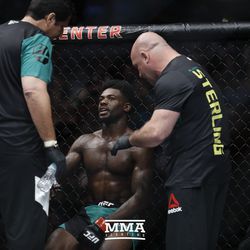 Aljamain Sterling gets some advice after first round.
