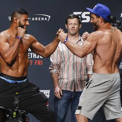 Dhiego Lima and Jesse Taylor face off at the TUF 25 Finale ceremonial weigh-ins Thursday at Park Theater in Las Vegas.