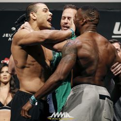 Paulo Borrachinha shoves Oluwale Bamgbose in the face at UFC 212 weigh-ins.