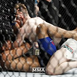 Brett Johns rains down elbows on Albert Morales at UFC Fight Night 113 on Sunday at the The SSE Hydro in Glasgow, Scotland.