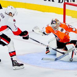 Steve Mason with a save against Bobby Ryan during the shootout