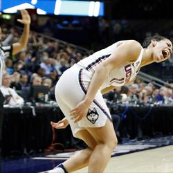 UConn’s Kia Nurse (11) celebrates after making her seventh three-pointer of the first half.