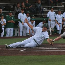 The second Eastern Michigan run sliding into home.<br>